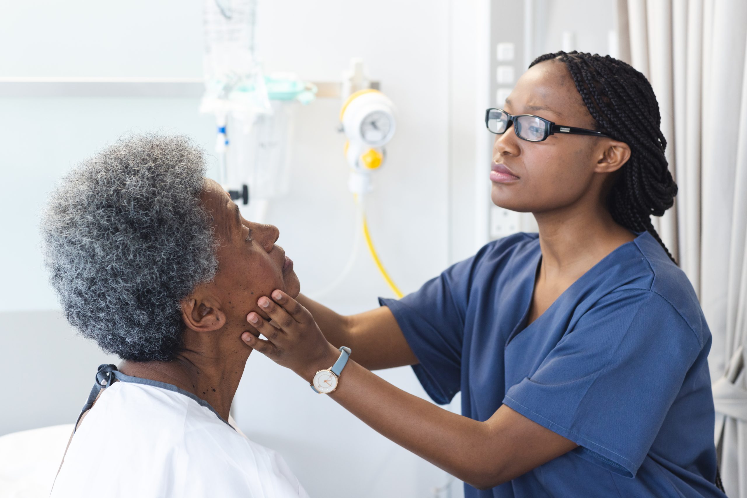 Nursing assistant student providing patient care